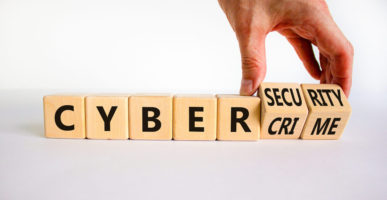 hand changing blogs from cybercrime to cybersecurity