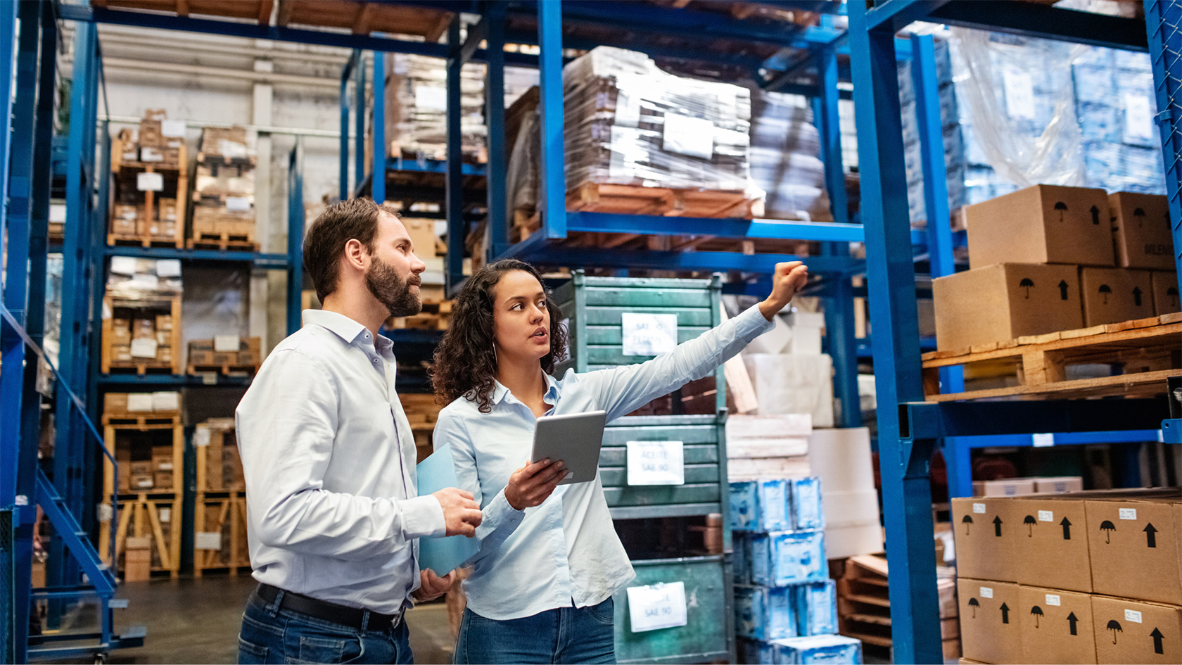 man and woman in warehouse